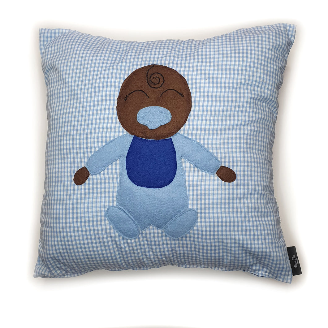Hazeldee Home Handmade Munchkin Baby cushion on a blue gingham base.   The Munchkin Babies are an extension of the Munchkin Collection and are a great baby shower gift to welcome a new born baby to the world! They are a fantastic addition to a nursey or playroom.  Approximately 16