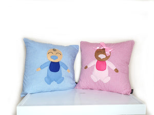 Hazeldee Home Handmade Munchkin Baby cushion on a blue gingham base.   The Munchkin Babies are an extension of the Munchkin Collection and are a great baby shower gift to welcome a new born baby to the world! They are a fantastic addition to a nursey or playroom.  Approximately 16" x 16" (40cm x 40cm) with a zip at the base.