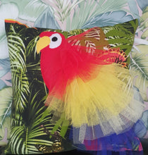 Load image into Gallery viewer, Handmade Parrot bird illustration character cushion with 3D feather effect trim.      A great conversational parrot cushion for kids and grown ups alike!  Bring some fun and colour into your space with this handmade cushion with a bold red parrot cushion with plume of red, yellow and blue feather-like trim with a tropical leaf fabric base!  A one-of-a-kind Hazeldee Home design.  Approximately 16&quot; x 16&quot; (40cm x 40cm) with a centre back zip. Comes with a polycotton cushion inner.
