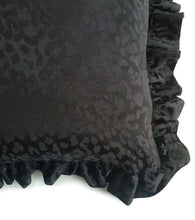 Load image into Gallery viewer, Hazeldee Home handmade black leopard jacquard design cushion with a fancy ruffle edge.  Perfect for living rooms and bedrooms alike.  A classy take on leopard that acts as a semi-plain print with silky and mat jacquard.  The ruffles add fun, romance and add that extra touch of glamour!  Approximately 18&quot; x 18&quot; (45cm x 45cm) excluding the with a concealed zip. 
