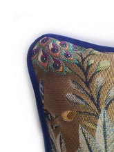Load image into Gallery viewer, Handmade double-sided cushion featuring an intricate jacquard pattern with peacocks, botanical greens at the front and a contrasting bold cobalt blue Italian velvet fabric on the reverse, piped with the same cobalt velvet.   Approximately 18&quot; x 18&quot; (45cm x 45cm) square with a concealed zip.  Comes with a polycotton lined cushion inner.  Do not wash, Dry Clean Only.
